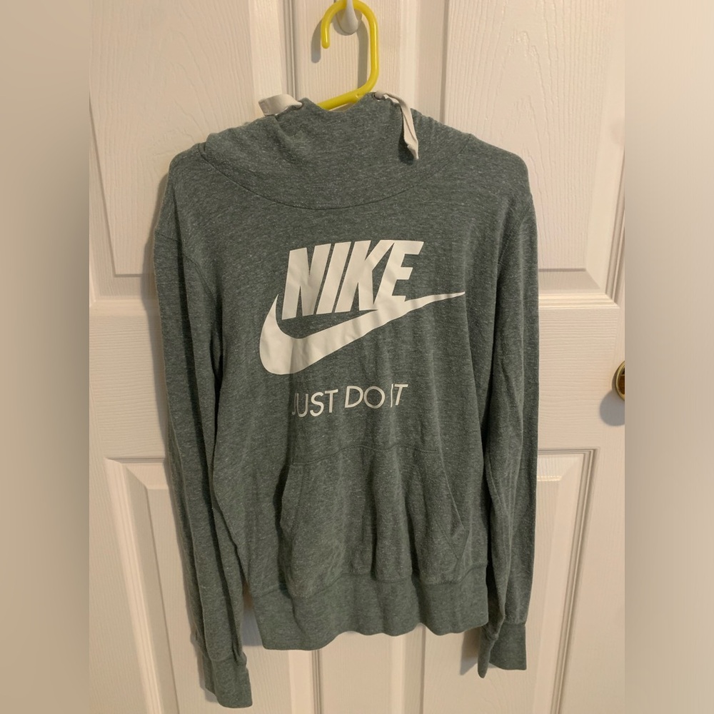 Size small, green nike hoodie.